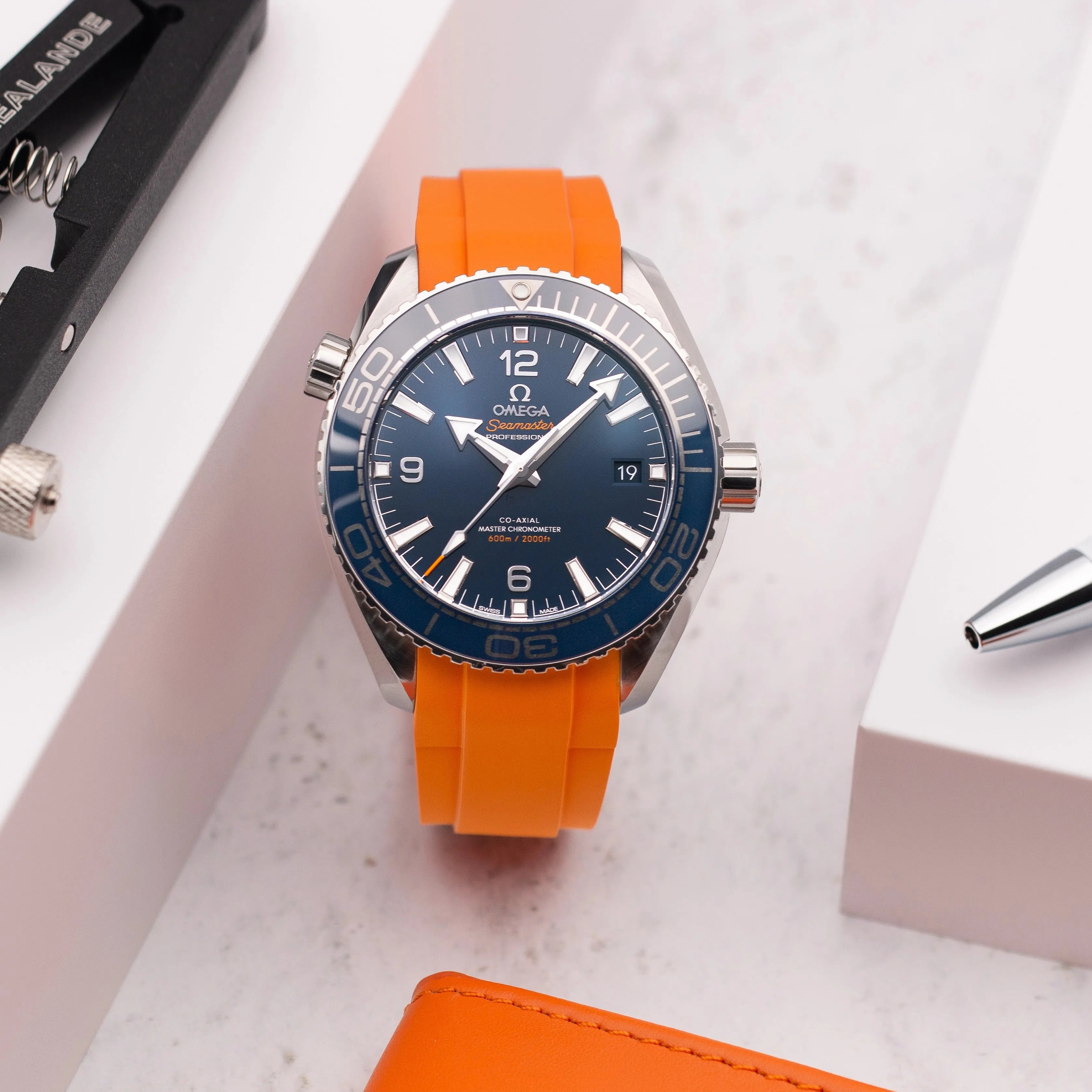 Omega seamaster planet ocean orange price best sale